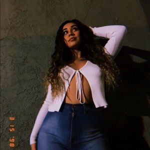 White long sleeve with slit in the middle